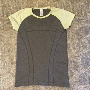 worn a few times athletic top with yellow accents